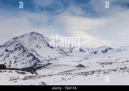 Snow- capped Mount volcanoes, volcanic massive, one of the volcanic complex on the Kamchatka Peninsula in the far east of Russia. Pacific ring fire. Stock Photo