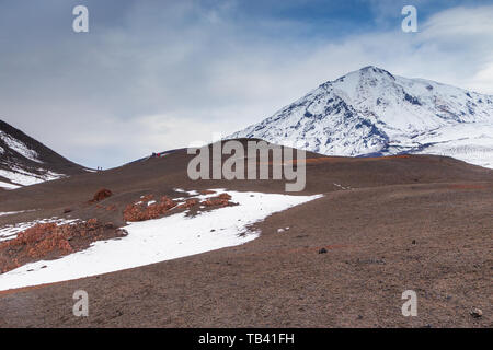 Snow- capped Mount volcanoes, volcanic massive, one of the volcanic complex on the Kamchatka Peninsula in the far east of Russia. Pacific ring fire. Stock Photo