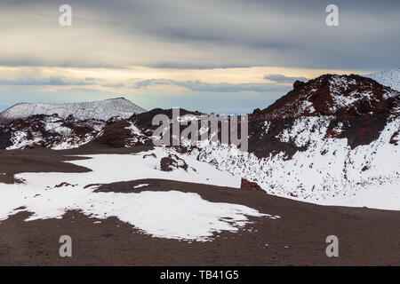 Snow- capped Mount volcanoes, volcanic massive, one of the volcanic complex on the Kamchatka Peninsula in the far east of Russia. Pacific ring fire. Stock Photo