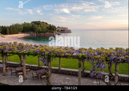 View from Villa Milocer towards Sveti Stefan, a 15th century island village built atop a rocky island of the coast of Montenegro, and now a luxury res Stock Photo