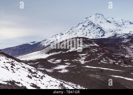 Snow- capped Mount volcanoes, volcanic massive, one of the volcanic complex on the Kamchatka Peninsula in the far east of Russia. Pacific ring fire. Stock Photo