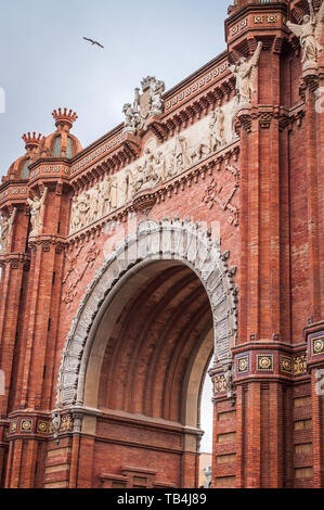 Architectural Close-up of Monumental Red Brick Arch in Barcelona, Spain Stock Photo