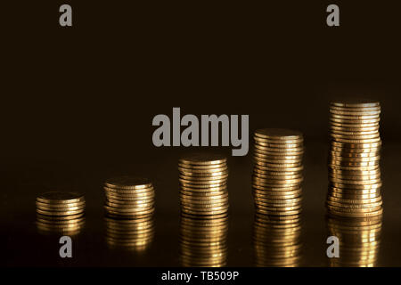 Investment concept background with graph made of coins Stock Photo