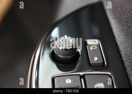 button control electric car mirror Stock Photo