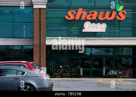 A logo sign outside of a Shaw's Supermarkets retail grocery store location in Colchester, Vermont on April 23, 2019. Stock Photo