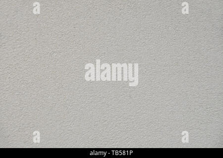 Decorative embossed plaster background. Abstract background. Texture of the old plastered wall. Stock Photo