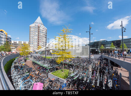 Rotterdam, Netherlands - May 11, 2019 : Bicycles parking near blaak station in the city center on a sunny day Stock Photo