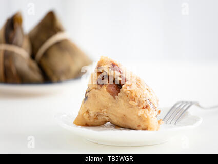 traditional chinese rice dumplings on table Stock Photo