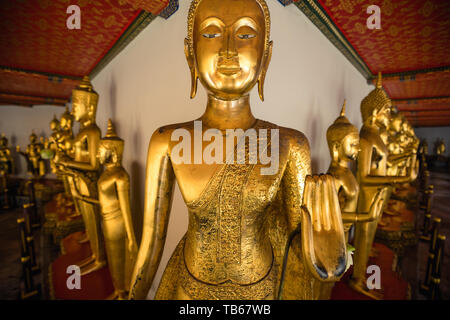 row of buddha statues in Wat Pho temple in Bangkok , Thailand Stock Photo