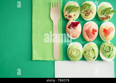Composition with tasty deviled eggs on color background Stock Photo