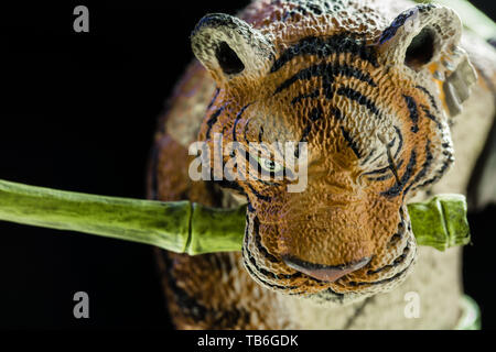 tiger plastic toy figure closeup view Stock Photo