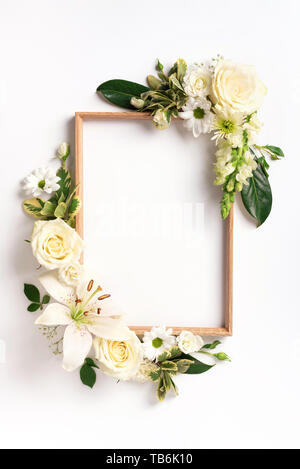 Frame of rose, lily, gerbera flowers over white background. Valentines day, Woman day concept. Spring or summer banner with copy space. Banner. Stock Photo