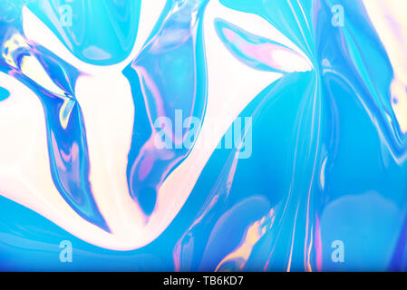 Neon holographic background. Wallpaper hologram with copy space. Wrinkled abstract texture with multiple colors Stock Photo