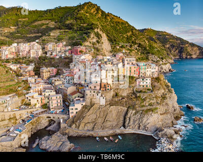 Aerial view of Manarola, the second-smallest of the famous Cinque Terre towns, one of the most charming and romantic of the Cinque Terre villages, Lig Stock Photo