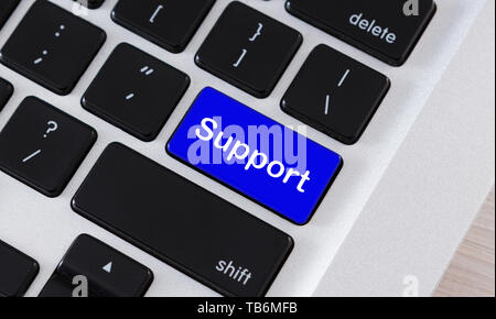 Maintenance concept. Blue keyboard button with text Support on it Stock Photo