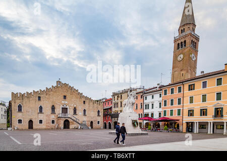 Portogruaro, Veneto Italy - May 22, 2019: Cityscape with St. Andrea clock tower, city hall and the WWI monument in Piazza della Republica Stock Photo