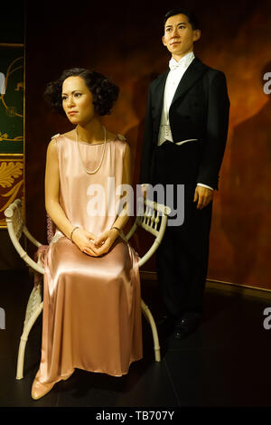 Bangkok, Thailand, March 2013 A waxwork of The Royal Family of Thailand, Prince Mahidol Adulyadej and Mom Sangwan on display at Madame Tussauds wax mu Stock Photo