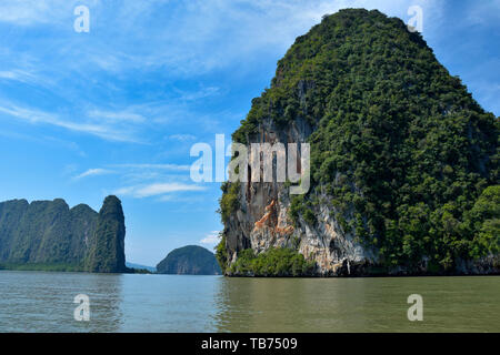 Impressive day time summer landscape with rocks in the water near James Bond Island, Thailand. Stock Photo