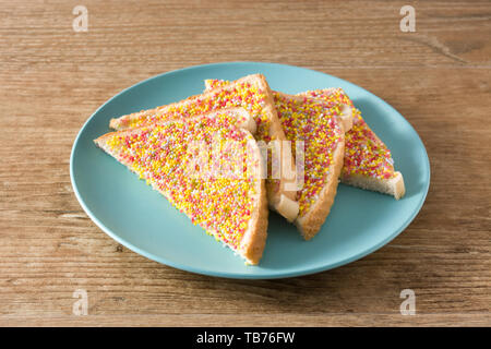 Traditional Australian fairy bread on wooden table Stock Photo