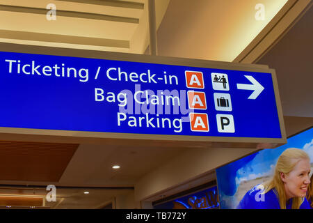 Orlando, Florida.  March 01, 2019. Top view of Terminal B Ticketing and Check-in sign at Orlando International Airport  (2) Stock Photo