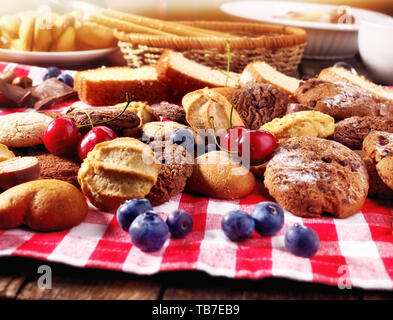 Cookies biscuit with blueberry chocolate bake and cherry cupcake Stock Photo