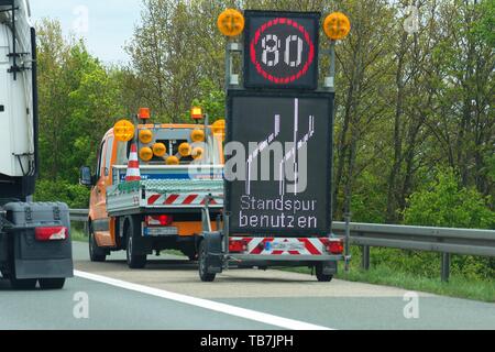 Warnings with a vehicle of the motorway maintenance authorities on the highway, Germany Stock Photo