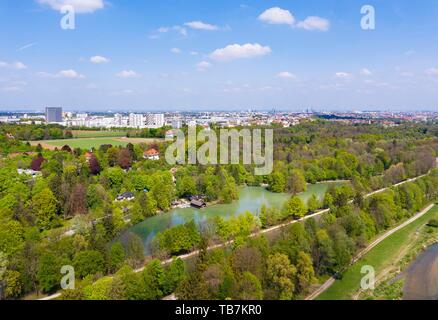 Hinterbruhler See in the Isar valley, Thalkirchen district, Siemens-Hochhaus in Obersendling at the back, Munich, drone shot, Upper Bavaria Stock Photo