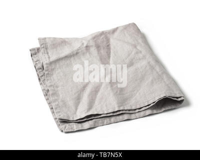 Side view on folded gray linen napkin isolated on white background. light gray linen napkin. Isolated on white with clipping path. Stock Photo