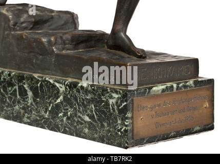 Max Kruse (1854 - 1942) - The Messenger of Marathon, honorary endowment from the Reichssportführer von Tschammer und Osten for the Olympic Games 1936, Bronze, black-brown patinated (rubbed, laurel branch missing), the base with the artist's signature and inscription 'NENIKHKAMEN' and foundry signature 'Gladenbeck GmbH', on green marble base with dedication plaque (tr.) 'Honorary Endowment from the Reichssportführer v. Tschammer und Osten / Olympia Year 1936' (height ca. 37 cm). With a black and white photograph in old frame, handwritten on the mo, Additional-Rights-Clearance-Info-Not-Available Stock Photo