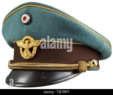 A visor cap for generals of the police, Made of fine police-green gabardine cloth, dark brown trim band, gold piping. Golden-yellow silk lining (cap trapezoid is missing), the light brown leather sweatband with the manufacturer's mark 'Fraenkel Wien'. Gilt police eagle. Gold cap cord (some damage). Used visor cap. historic, historical 20th century, Editorial-Use-Only Stock Photo