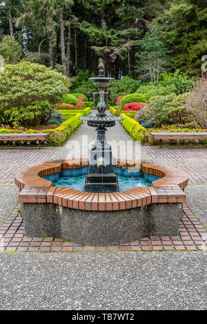 Water fountain in the center of the formal garden at Shore Acres State Park, Coos Bay, Oregon Stock Photo