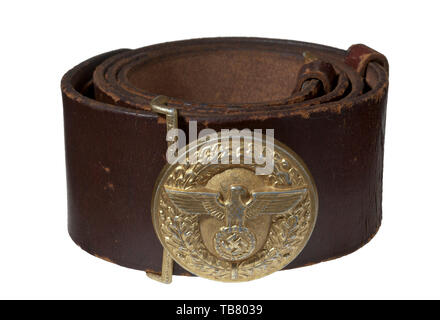 THE JOHN WAHL BELT AND BUCKLE COLLECTION, A NSDAP Official Leather Belt and Buckle, Stamped aluminium 57 mm diameter buckle retains 85% gold wash. Reverse has raised manufacturer's code 'RZM (double circle) M4/24'. 60 mm service worn brown leather belt with 'RZM (double circle) L2/(?)/42 KERNSTÜCK' stamped adjacent to aluminium catch stamped 'RZM (double circle) M/72'. Belt is complete with two sliding, vertical 15 mm brown leather keepers and a partially damaged size adjustment tongue. Length approx. 110 mm., Editorial-Use-Only Stock Photo