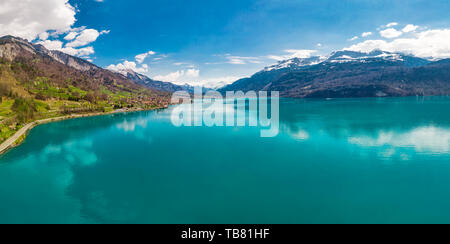 Brienz town on lake Brienz by Interlaken with the Swiss Alps covered by snow in the background, Switzerland, Europe Stock Photo