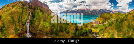 Lake Brienz and Giessbach Waterfall by Interlaken with the Swiss Alps covered by snow, Switzerland Stock Photo