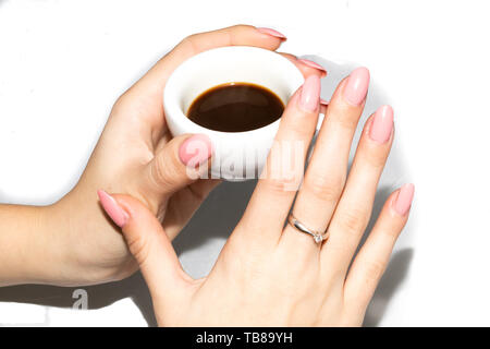 Taking the neapolitan coffee in ceramic cup Stock Photo