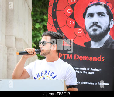 London, UK. 30th May, 2019. Protesters affiliated to the Pashtun Tahafuz Movement (PTM), many of the wearing Pashteen hats and traditional clothing, shout and protest against alleged violence and torture by Pakistani military and state forces against Pashtuns. Many Pashtuns are ethnic Afghans, living in Pakistan and Afghanistan. Credit: Imageplotter/Alamy Live News Stock Photo