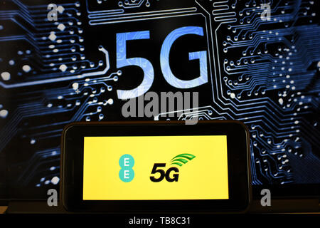 London, UK. 30th May, 2019. Photo taken on May 30, 2019 shows the logo of 5G network in London, Britain. Mobile network operator EE said on last Wednesday that it would launch Britain's first 5G service in six major cities on May 30th. Credit: Han Yan/Xinhua/Alamy Live News Stock Photo