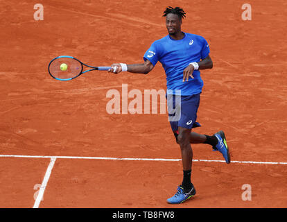 Paris, Paris. 30th May, 2019. Gael Monfils of France hits a return during the men's singles second round match with Adrian Mannarino of France at French Open tennis tournament 2019 at Roland Garros, in Paris, France on May 30, 2019. Credit: Han Yan/Xinhua/Alamy Live News Stock Photo