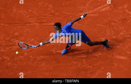 Paris, Paris. 30th May, 2019. Gael Monfils of France hits a return during the men's singles second round match with Adrian Mannarino of France at French Open tennis tournament 2019 at Roland Garros, in Paris, France on May 30, 2019. Credit: Han Yan/Xinhua/Alamy Live News Stock Photo