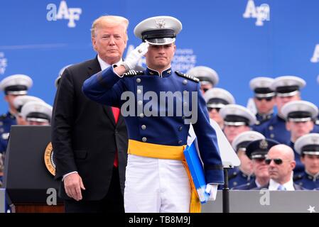 Colorado Springs, Colorado, USA. 30th May, 2019. U.S Air Force Cadet 1st Class Trey Landon Arnold, the Class of 2019 top grad, salutes after being congratulated by President Donald Trump during the U.S. Air Force Academy Graduation Ceremony at the USAF Academy Falcon Stadium May 30, 2019 in Colorado Springs, Colorado. Credit: Planetpix/Alamy Live News Stock Photo