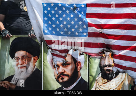 Tehran, Iran. 31st May, 2019. Burned American flag is pictured during a protest marking the annual al-Quds Day (Jerusalem Day) on the last Friday of the Muslim holy month of Ramadan. Credit: Saeid Zareian/dpa/Alamy Live News Stock Photo