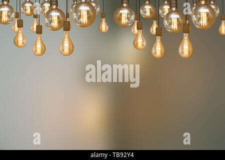 burning retro light bulb on blurred background colorful vintage design Stock Photo