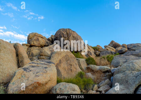Boulder formation hill at  Apple Valley, California,  in the Mojave Desert. Stock Photo