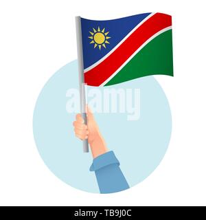 Namibia flag in hand. Patriotic background. National flag of Namibia  illustration Stock Photo