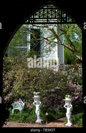 A garden path is pictured from inside the chapel at Rosewood Manor, also known as the Sykes-Leigh House, April 16, 2010, in Columbus, Mississippi. Stock Photo