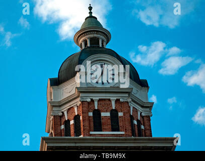 The clock tower of the Lowndes County Courthouse displays the time in downtown Columbus, Mississippi, April 20, 2010. Stock Photo