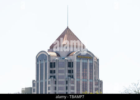 Roanoke, USA - April 18, 2018: Closeup view of tower in downtown city in Virginia business office building sign for Wells Fargo Bank Stock Photo