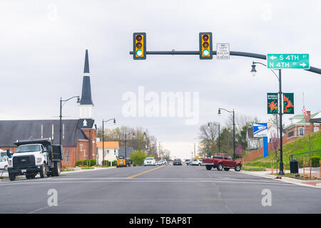 Wytheville, USA - April 19, 2018: Small town village street light in southern south Virginia with historic buildings and church Stock Photo