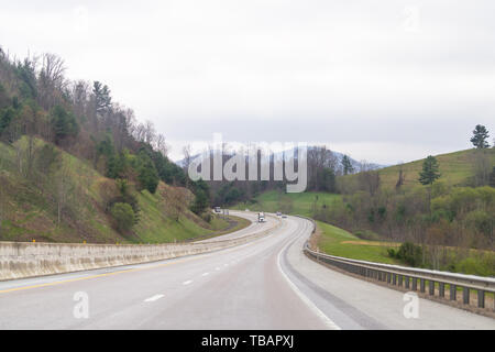 Bond, USA - April 19, 2018: Smoky Mountains near Asheville, North Carolina at Tennessee border during spring day sky trees on South 25 highway road wi Stock Photo