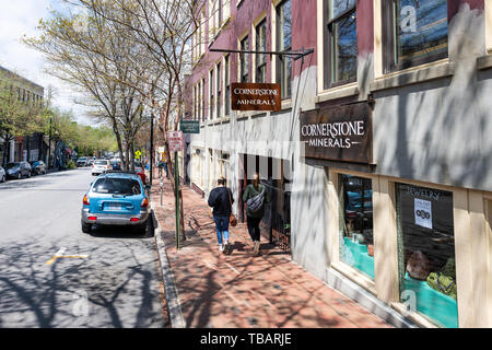 Asheville, USA - April 19, 2018: Downtown old town street in North Carolina NC famous town city with mineral store shop Stock Photo